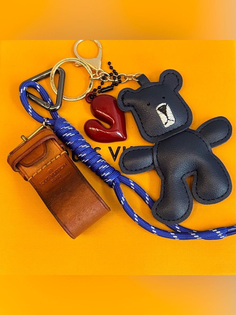 Louis Vuitton Leather Vachetta
Poignet Strap, Bag Charm, Bear, Heart 10 in